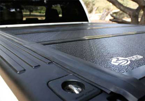 BAK BakFlip F1 Folding Hard Tonneau Cover 2019-up Ram 6'4" Bed - Click Image to Close